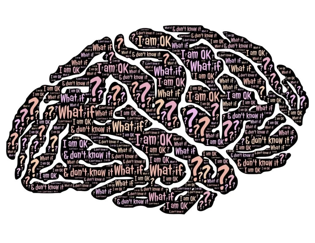Brain shape with mental health phrases.
