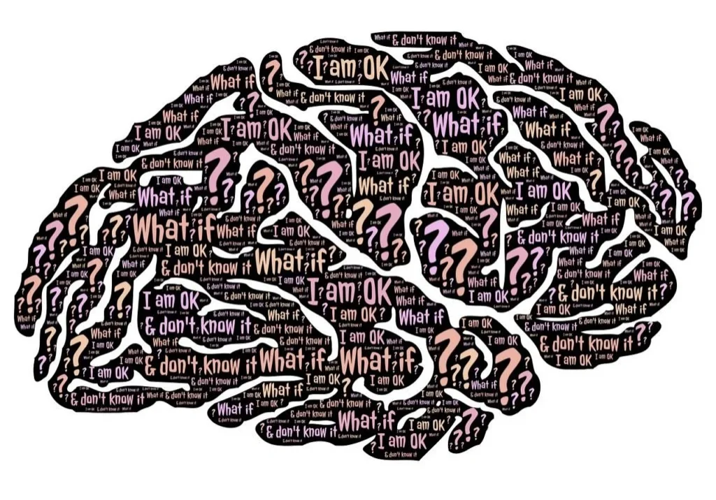 Brain shape with mental health phrases.